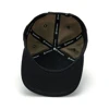 Image of a camo cap with a black and gray Mercury patch on the front