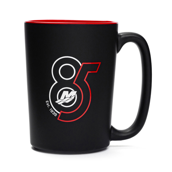 Image of a black mug with a red interior and white and red 85th anniversary design