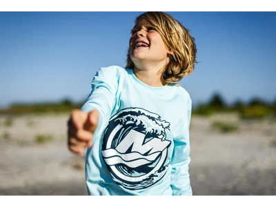 Image of a blue long sleeve with black and white Mercury wave design