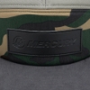 Image of the Mercury Patch logo on the front of camo Leather Patch Cap