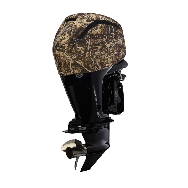 Side view of a Mercury outboard motor with a camo vented engine cover fitted over the top, showing the motor's black cowling and lower unit.